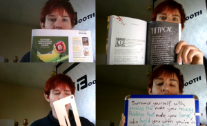 A woman with short red hair holds up magazines and books